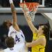 Michigan freshman Mitch McGary attempts to block Kansas senior Travis Releford during the first half at Cowboys Stadium in Arlington, Texas on March 29, 2013. Melanie Maxwell I AnnArbor.com